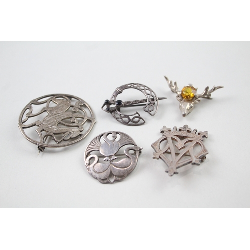 398 - Five silver Scottish/Celtic brooches including Shetland Silver (42g)