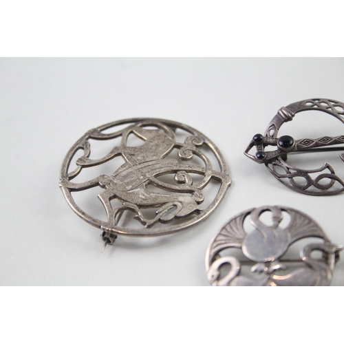 398 - Five silver Scottish/Celtic brooches including Shetland Silver (42g)