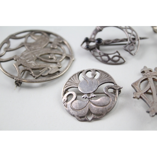 398 - Five silver Scottish/Celtic brooches including Shetland Silver (42g)