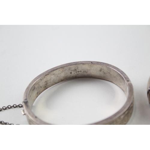 404 - Two silver vintage bangles including Charles Horner (53g)