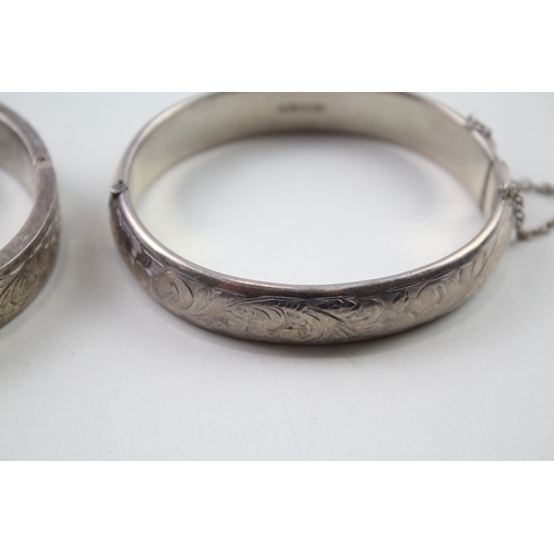 404 - Two silver vintage bangles including Charles Horner (53g)