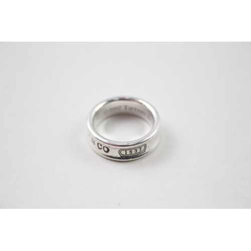 411 - Silver concave band ring by designer Tiffany & Co (8g)