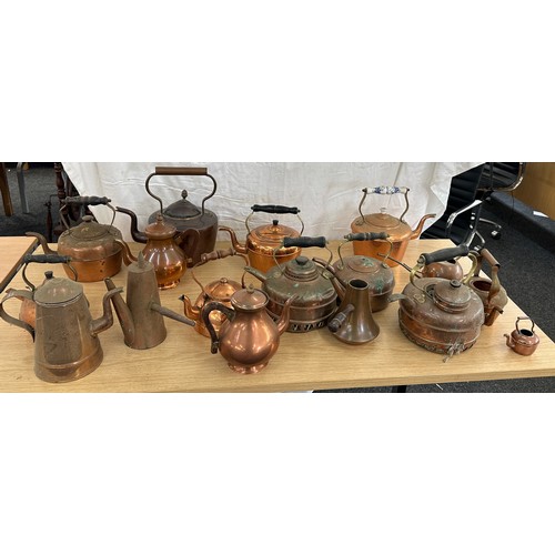 103 - Large selection of assorted sized vintage copper kettles