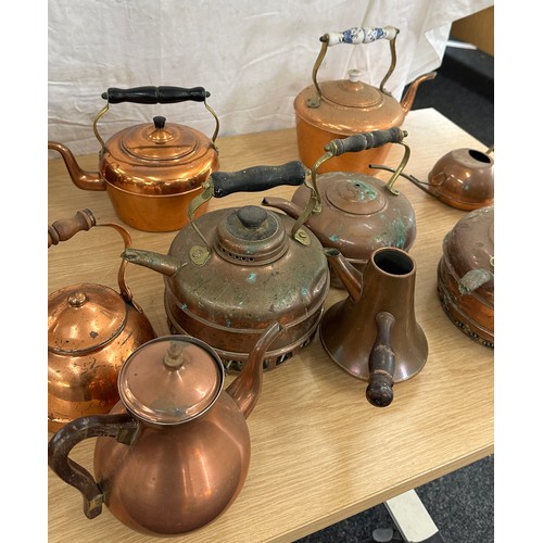 103 - Large selection of assorted sized vintage copper kettles