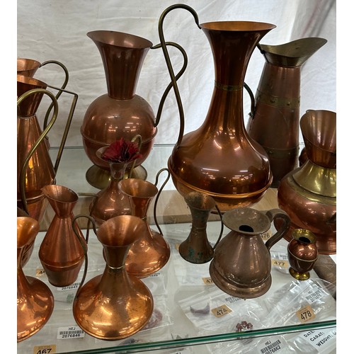 164 - Large selection of vintage copper jugs assorted sizes