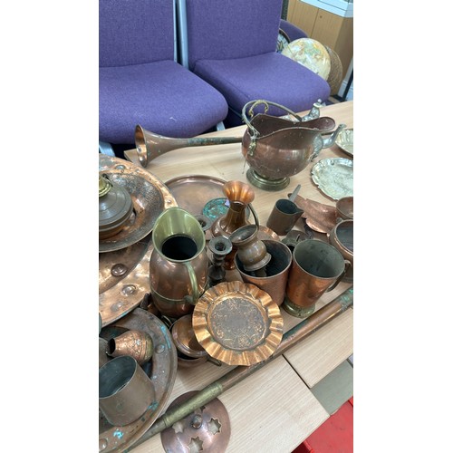 104 - Large selection of vintage copper items to include horns, vase, coal scuttle etc