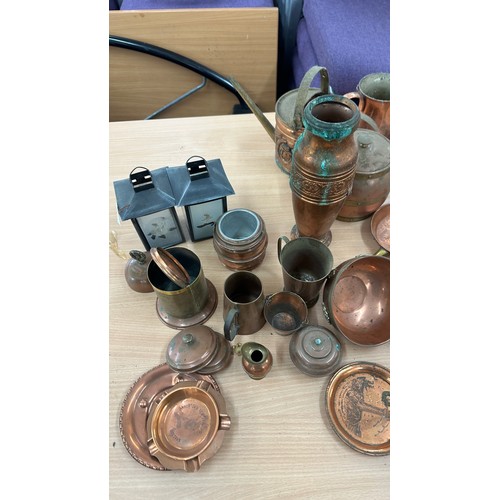 104 - Large selection of vintage copper items to include horns, vase, coal scuttle etc