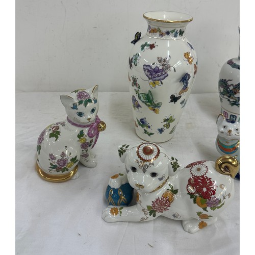 106 - Selection of assorted oriental pottery includes Vase with 3d butterfly design height approximately 1... 