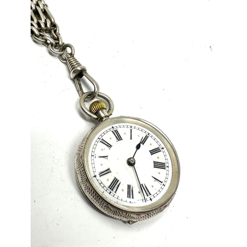 449 - Antique silver fob watch and chain the watch is ticking