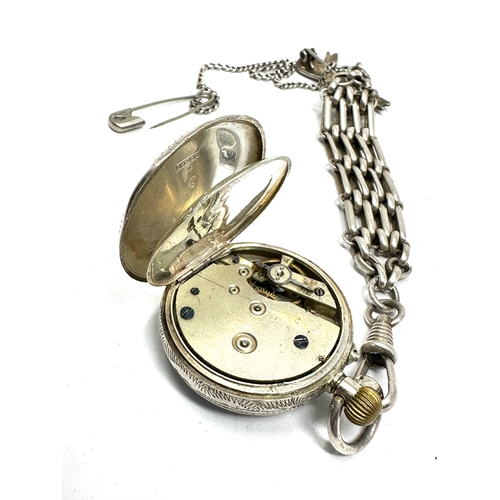 449 - Antique silver fob watch and chain the watch is ticking