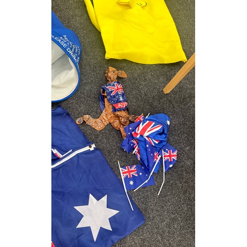 127 - Selection of fancy dress items to include a kangaroo, Australian flag and a can of lager