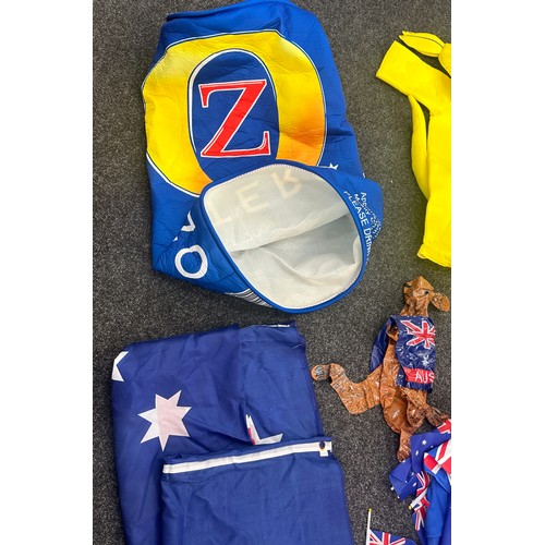 127 - Selection of fancy dress items to include a kangaroo, Australian flag and a can of lager