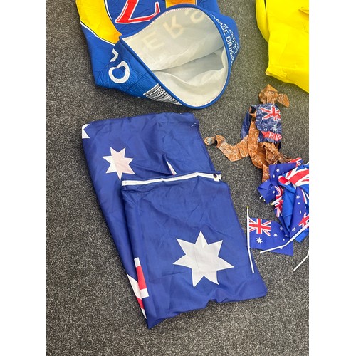 127 - Selection of fancy dress items to include a kangaroo, Australian flag and a can of lager