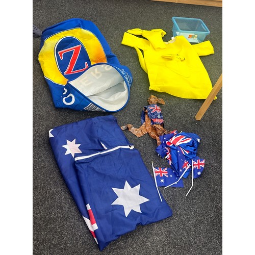 127 - Selection of fancy dress items to include a kangaroo, Australian flag and a can of lager