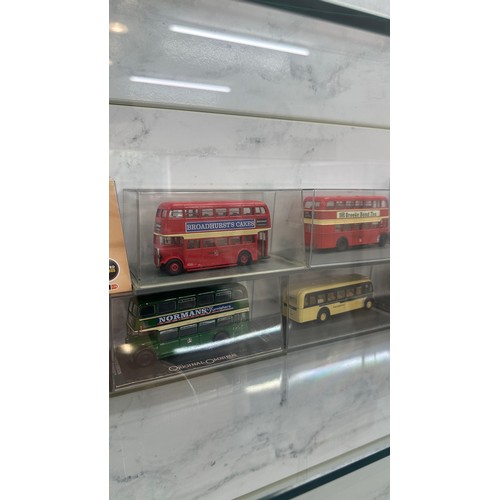 131 - Selection of die cast bus vehicle models to include ' Normans Furnishers', ' Broadhursts cakes' etc