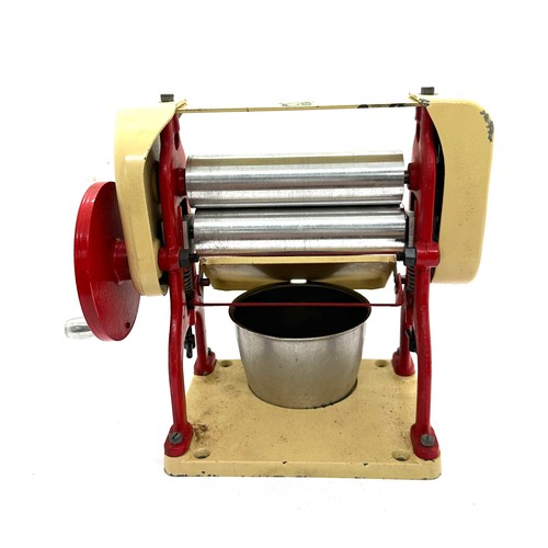 106 - Vintage Knights head tin plate die cast mangle