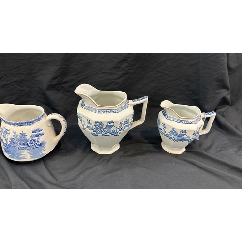 53 - Four vintage blue and white patterned jugs overall height of tallest approx 7 inches