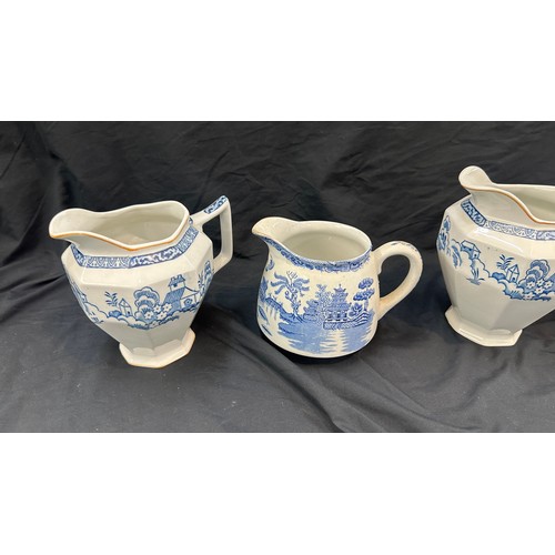 53 - Four vintage blue and white patterned jugs overall height of tallest approx 7 inches