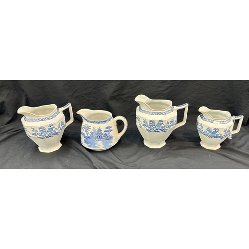 53 - Four vintage blue and white patterned jugs overall height of tallest approx 7 inches