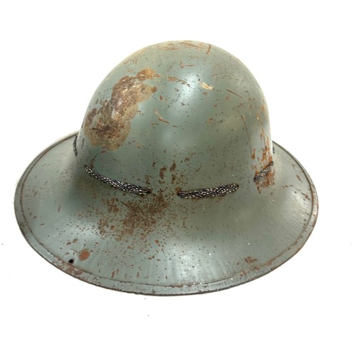 70A - Two military style helmets