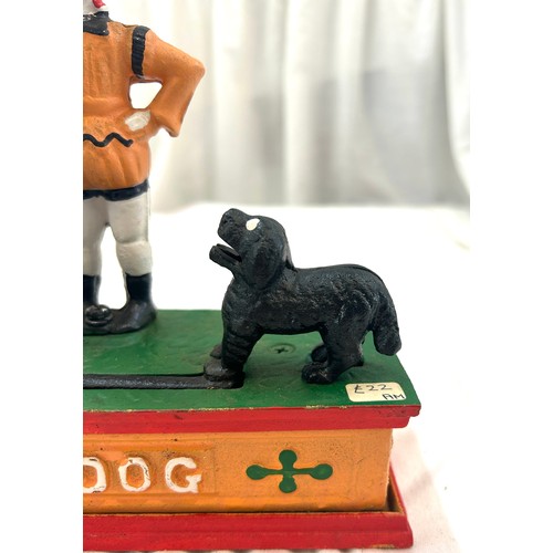 64 - Vintage mechanical cast iron Trick dog money bank, approximate measurements: 8 x 8.5 inches, working... 