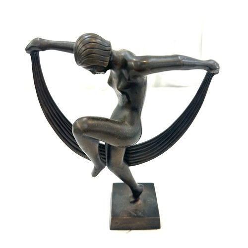 75 - Brass with bronze finish art deco style lady figurine, approximate height 9.5 inches, width 8 inches