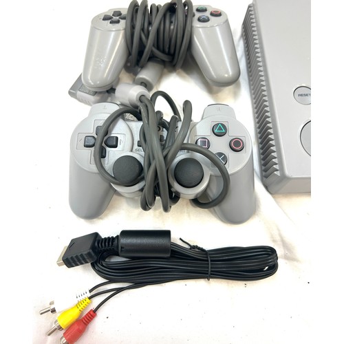 5 - Playstation 1 with leads, 2 controllers and some games, untested