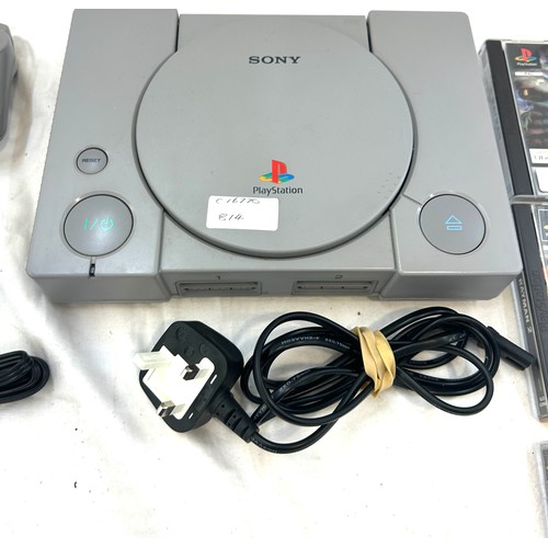 5 - Playstation 1 with leads, 2 controllers and some games, untested