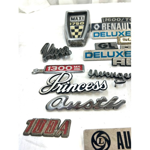 37 - Large selection vintage car brand and model badges