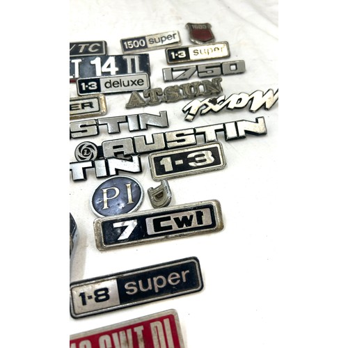 37 - Large selection vintage car brand and model badges