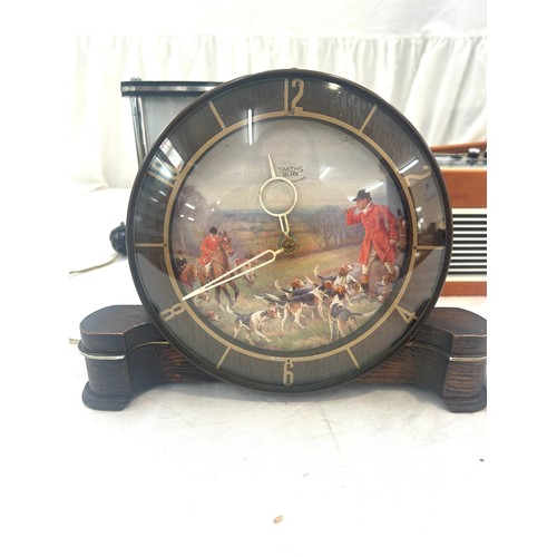 26 - Selection vintage mantel clocks to include various Smiths designs including a hunting scene, vintage... 