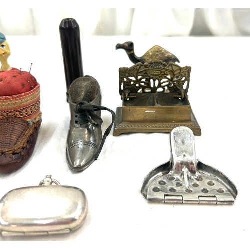 25 - Selection of collectables includes pin holders etc