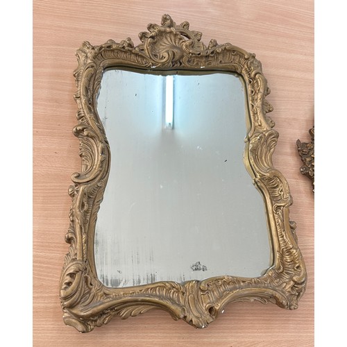 20 - Gilt framed ornate oval mirror resin gilt style wall mirror, approximate measurements of largest 22 ... 