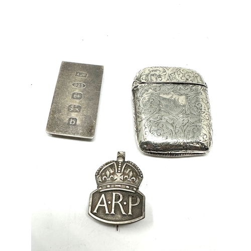 68 - selection of silver items includes vesta cae money clip & a.r.p badge