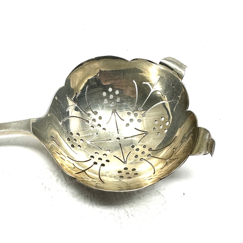 77 - Silver tea strainer spoon sheffield silver hallmarks makers edward viner weight 44g