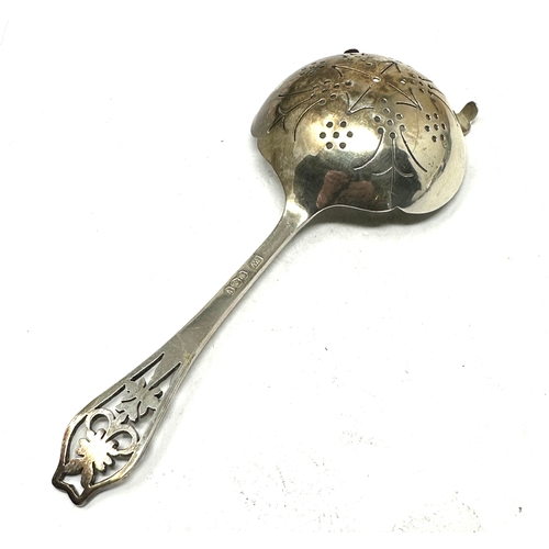 77 - Silver tea strainer spoon sheffield silver hallmarks makers edward viner weight 44g