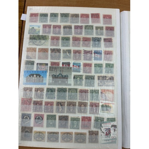 31 - Album containing various loose stamps, multiple countries, denominations