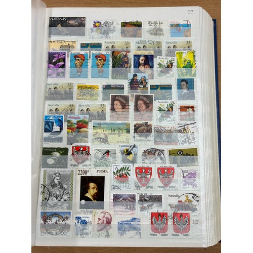 31 - Album containing various loose stamps, multiple countries, denominations