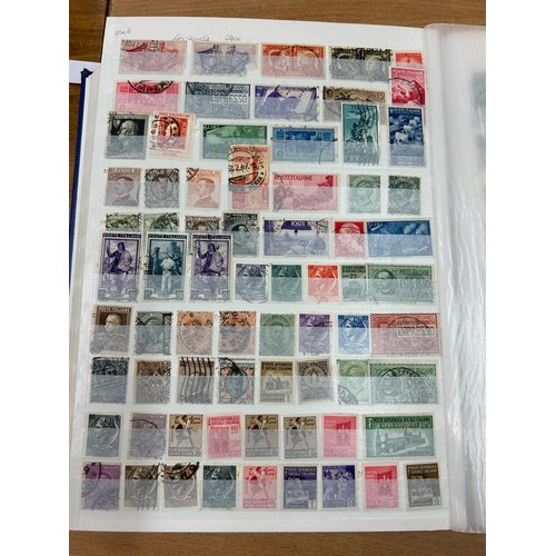 31 - Album containing various loose stamps, multiple countries, denominations