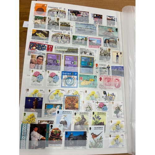 31 - Album containing various loose stamps, multiple countries, denominations