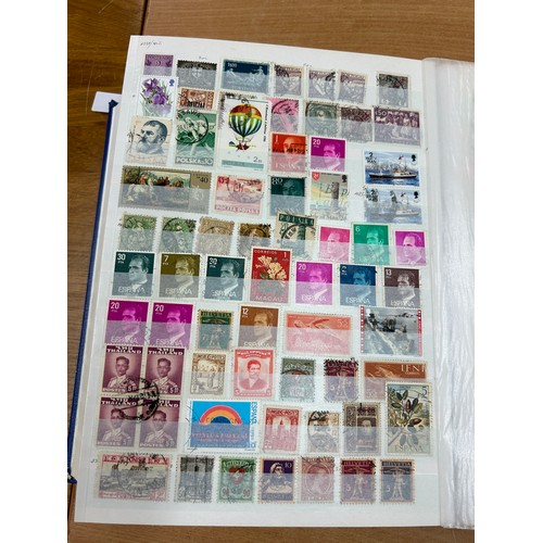 31 - Album containing various loose stamps, multiple countries, denominations