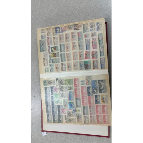 34 - Album containing various loose stamps, multiple countries, denominations