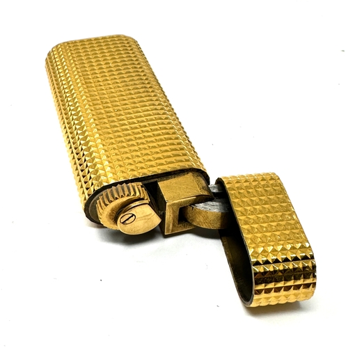 338 - Authentic Cartier Gold plated lighter.  Gold plated with a polished pyramid texture. 
2 .3'' Tall x ... 