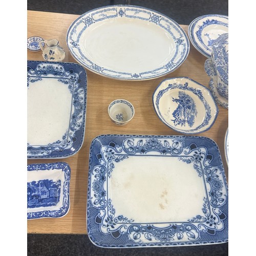 216 - Selection of vintage blue and white porcelain to include lidded serving bowl, meat plates etc