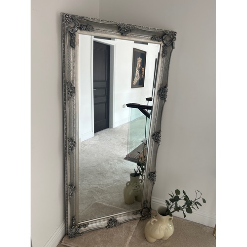 574 - Silver framed ornate hall mirror, approximate measurements: Height 64 inches, Width 31 inches