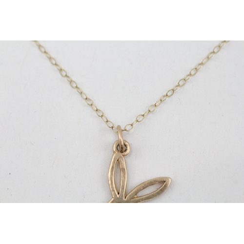 87 - 9ct gold playboy pendant necklace (1.1g)