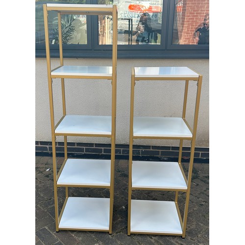 557 - 2 Free standing gold and white shelving units, approxiamte height tallest 59 inches, Width, Depth of... 