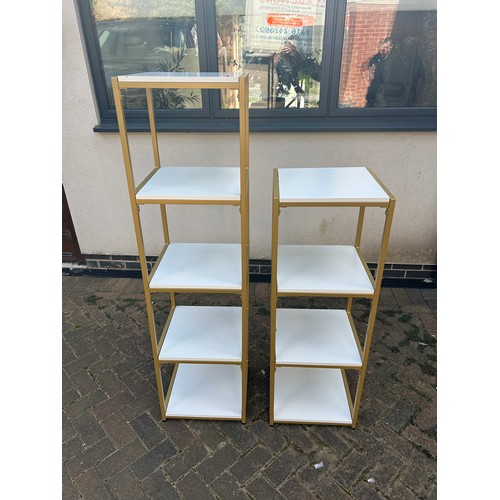 557 - 2 Free standing gold and white shelving units, approxiamte height tallest 59 inches, Width, Depth of... 