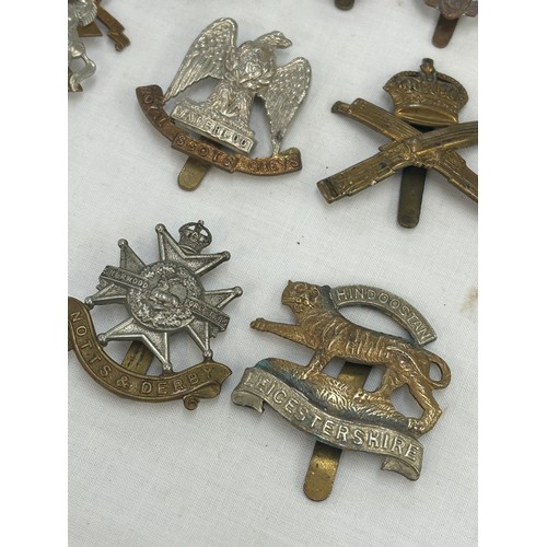 334 - Military Cap Badges Inc Dragoons, ATS, Australian, Etc x 10