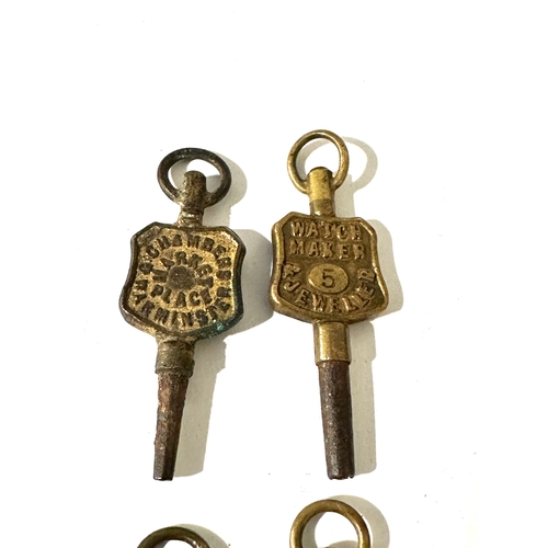 353 - 4 antique  advertising pocket watch keys